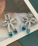 CIFEEO- Retro Blue Sterling Silver CrystalColoured Glaze Bow Stud Earrings DF1009