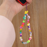 2021 New Colorful Acrylic Pearl Soft Pottery Cartoon Face Fruits Anti-lost Mobile Phone Strap Cord for Women Accessories