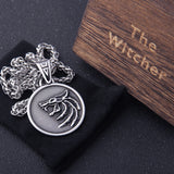 the Wizard wolf head pendant necklace for Geralt with a The Wild Hunt 3 Figure TV