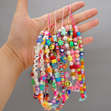 2022 Trendy Mobile Phone Strap Lanyard, Beaded Charm Chain Colorful Smile Pearl Rope Cell Phone Case Hanging Cord for Women