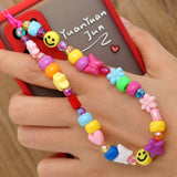 2021 New Colorful Acrylic Pearl Soft Pottery Cartoon Face Fruits Anti-lost Mobile Phone Strap Cord for Women Accessories